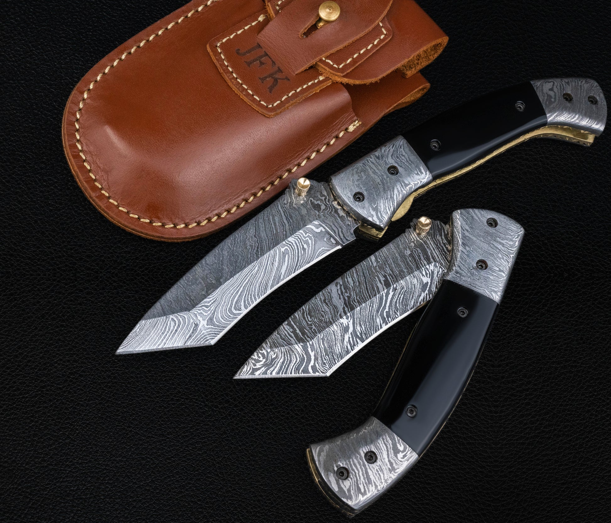 Curved Hand Forged Black Damascus Folding Knife