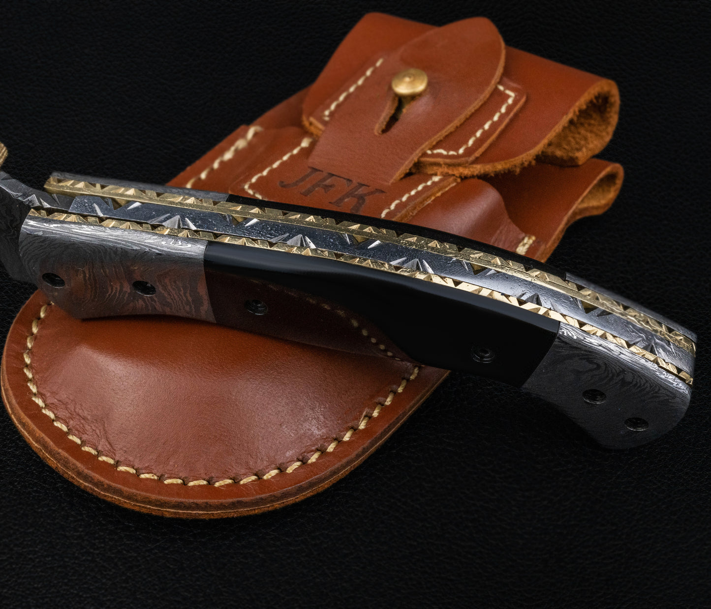 Curved Hand Forged Black Damascus Folding Knife